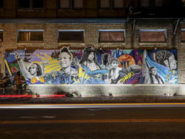 Illuminated mural highlighting injustice in the prison system