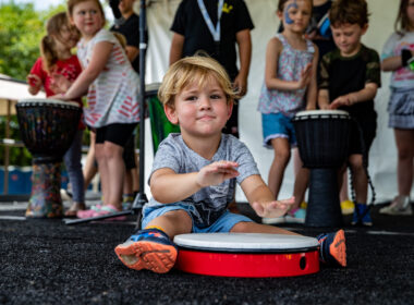 Little boy playing drum