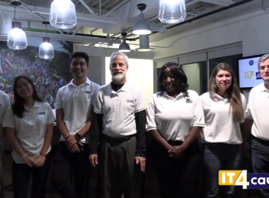 IT4Causes team stands together.