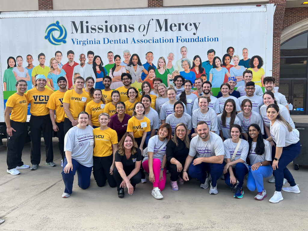 Volunteers from VCU's School of Dentistry and the Special Olympics' Special Smiles program