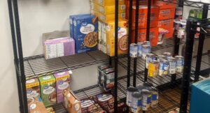 Non-perishable food items on shelves.