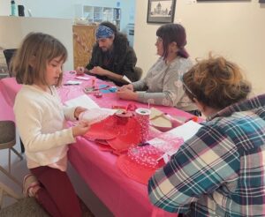 Participants of all ages create and craft at Community Art Day.