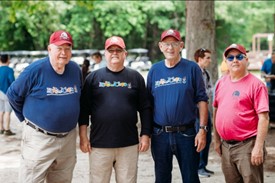 men pose at the fourth annual Sporting Clays Classic