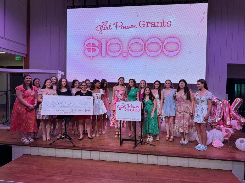 Girl Power Grants on stage giving a $10,000 grant to The McShin Foundation