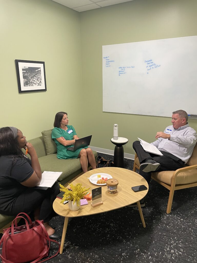 Jacob's Chance meets with marketing volunteers.