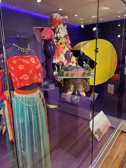 Colorful costumes displayed in "FANCY: Costumes, Characters and the Richmond Masque" exhibit.