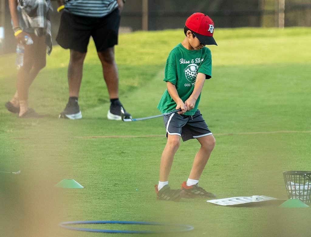 boy playing golf at the 2026 Fairway Festival